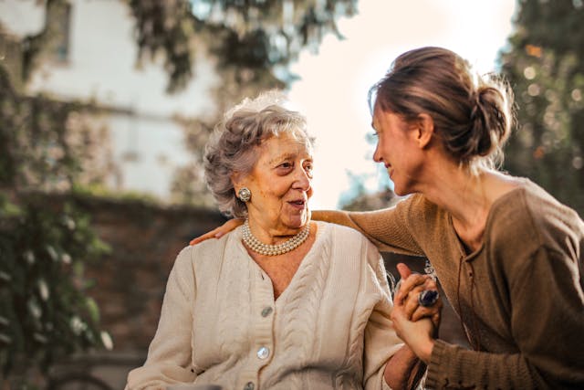 Woman talking to another woman